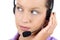 Young adult female call center woman telephone headset close up, eyes looking sideways, listening, white background