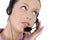 Young adult female call center woman telephone headset close up, eyes looking upwards, listening, white background