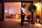 Young adult man preparing food for family on evening patio at ho