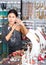 Young adult woman choosing jewelry in store