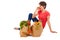Young adult woman with heavy shopping bags