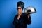 Young african american cooker woman wearing uniform holding waiter tray with dome cover mouth with hand shocked with shame for