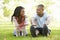 Young African American Couple Exercising In Park