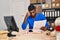 Young african american man ecommerce business worker worried reading document at office