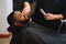 Young African-american man visiting barbershop