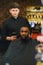 Young African-american man visiting barbershop