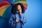 Young african american woman with afro hair under colorful umbrella for winter weather rain serious face thinking about question,