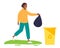 Young African American woman going to put garbage bag in garbage can. Black trash bag, yellow trash container. Waste