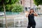 Young african american woman posed against fountain