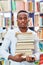 Young African as a student with books