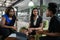 Young African businesswomen discussing work together in a modern office workspace