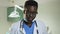 Young african doctor wearing glasses in the hospital office.