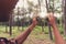 Young African man looking through binocular in the forest, Travel concept.