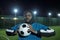 Young African man in sports uniform holding soccer ball in front of himself