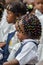 Young African school girl with beautifully decorated hair at pre-school in Matadi, Congo, Central Africa