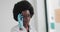 Young African Woman Doctor Or Nurse Standing In Medical Suit At Clinic And Looking At Camera. Confident Doctor. Portrait