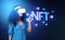 Young african woman in vr glasses, finger touch nft data blocks in metaverse