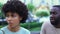 Young afro-american couple arguing outdoors, lies in relationships, breakup