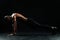 Young afro american sports man with beautiful muscular body doing pushup exercise