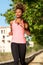 Young afro american woman running outdoors in morning