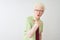 Young albino businessman wearing shirt and tie standing over isolated white background looking at the camera blowing a kiss with