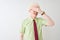 Young albino businessman wearing shirt and tie standing over isolated white background smiling and laughing with hand on face