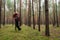 Young alone women in forest