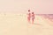 Young American Couple walking, relaxing on the beach in New Jersey, USA