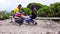 Young apprentice porters at abse camp on Mount Kilimanjaro take a break to enjoy a game of checkers