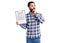 Young arab man holding clipboard with agreement document serious face thinking about question with hand on chin, thoughtful about