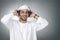 Young Arabian man listening to music using headphones