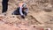 Young archeologist works on an archaeological site