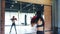 Young Asia lady kickboxing exercise workout punch doing shadow female fighter practice boxing in gym fitness class. Sportswoman