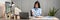 Young Asian Business woman sitting on the chair stretching herself and exercise for relaxation while working at office