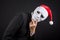 Young Asian businessman wearing white mask and santa hat