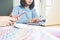 Young Asian businesswoman consulting at meeting table in the office.