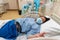 Young Asian Chinese lady in Contraction pain on hospital labour room