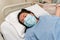 Young Asian Chinese lady in Contraction pain on hospital labour room