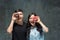 Young asian couple enjoy eating of sweet colorful donut