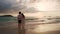 Young asian couple looking beautiful sunset on the tranquil beach, Summer vacation concept