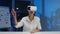 Young asian designer female using vr glasses virtual reality testing mobile app from develop software at modern creative home