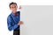 Young asian funny man standing behind blank board for copyspace