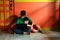 Young asian kids, brothers or siblings, with a laptop computer in a living room