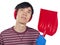 Young Asian man holding snow shovel