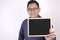 Young Asian Man Smiling and Presenting Empty Copy Space Blackboard