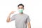 Young Asian Man wearing and pointing to hygienic mask to prevent infection, 2019-nCoV or coronavirus. Airborne respiratory illness