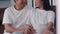 Young Asian Pregnant couple man touch his wife belly talking with his child. Mom and Dad feeling happy smile peaceful while take
