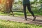 Young asian runner woman running in the park in sportswear morning time, Exercise and healthy concept, Selective focus