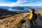 Young asian traveler backpack hiking on Roys peak track, Wanaka, South Island, New Zealand