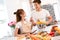 Young asian woman cutting slice vegetables making salad healthy food